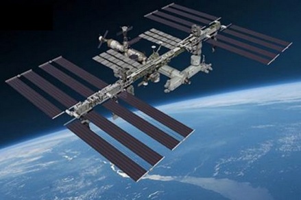 A picture of the International Space Station in orbit with the Global Ecosystem Dynamics Instrument (GEDI)